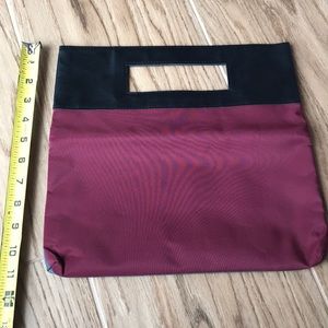 Two sided hand clutch